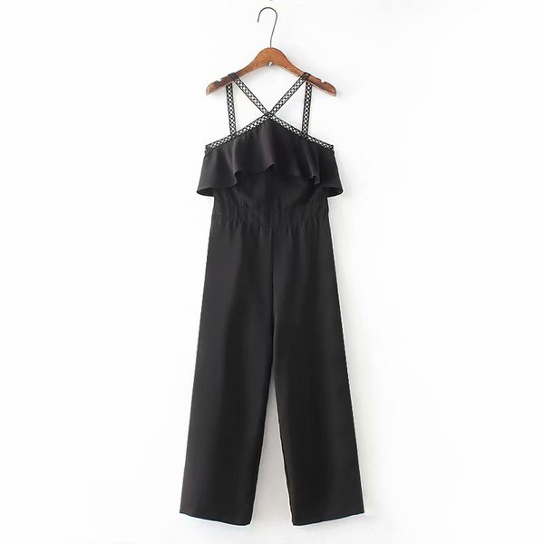 Stílusos női overall fekete és keresztpántos kivitelben