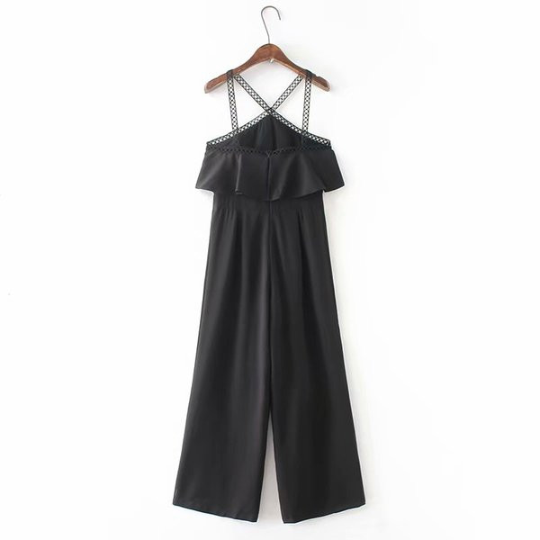 Stílusos női overall fekete és keresztpántos kivitelben