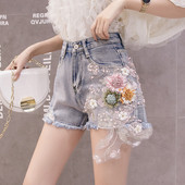 Modern női farmer rövidnadrág 3D elemmel