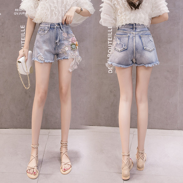 Modern női farmer rövidnadrág 3D elemmel