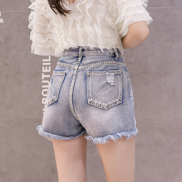 Modern női farmer rövidnadrág 3D elemmel