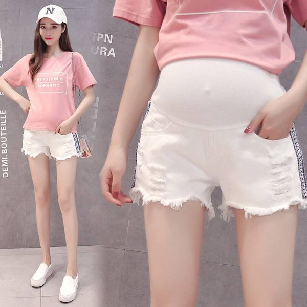 Alkalmi női rövidnadrág terhes nők számára fehér színben