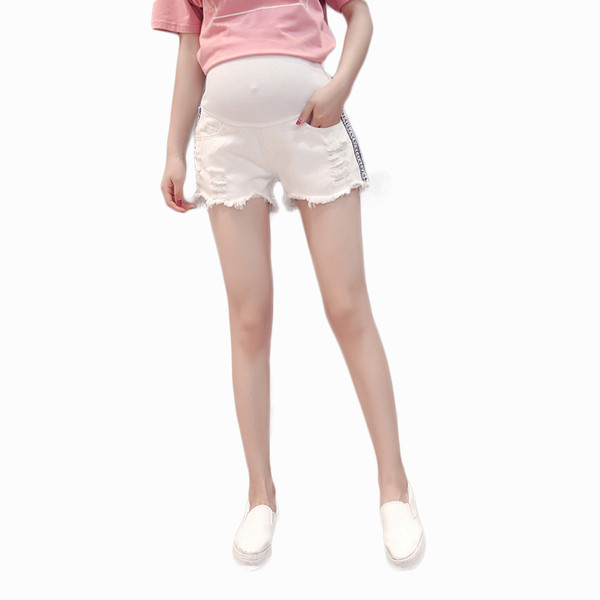 Alkalmi női rövidnadrág terhes nők számára fehér színben