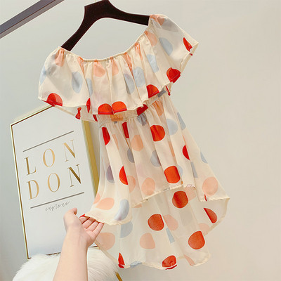 Bluză de damă asimetrică cu buline