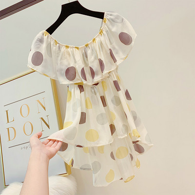 Bluză de damă asimetrică cu buline