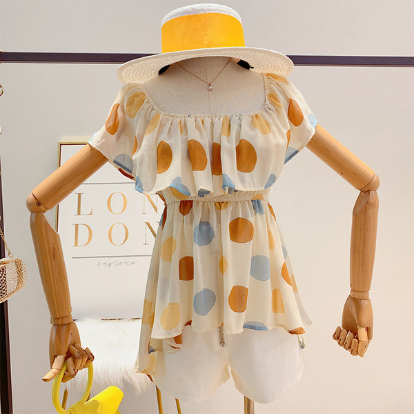 Bluză de damă asimetrică cu buline