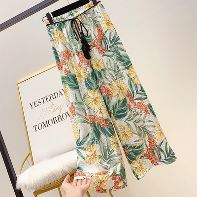 Pantaloni largi de dama cu model floral