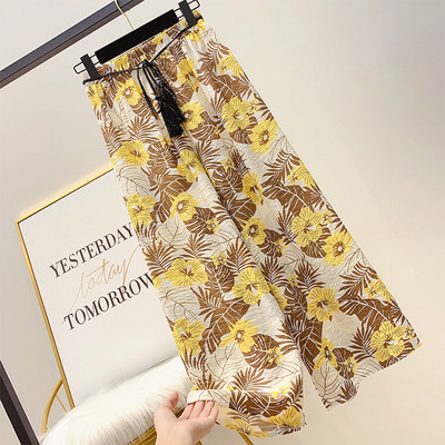 Pantaloni largi de dama cu model floral