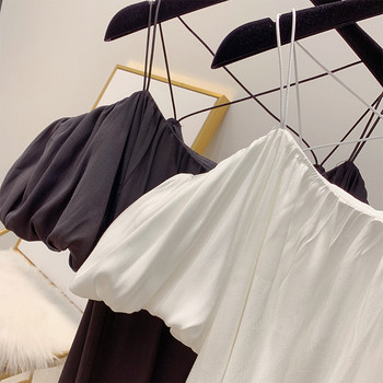 Női ruha csupasz vállval, fehér és fekete színben