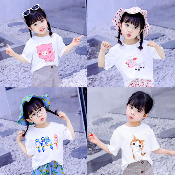Детска тениска за момичета-в бял цвят с различни апликации 