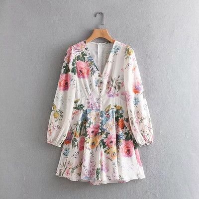 Női sifon jumpsuit V-nyakú és hosszú ujjú fehér és virágmintás