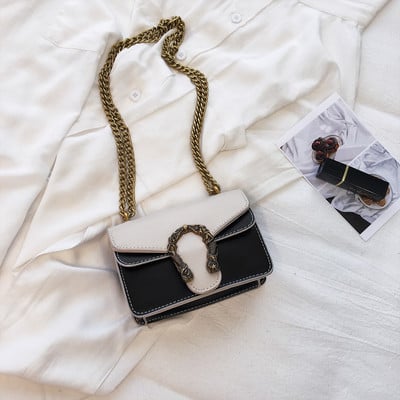 Modern női táska fém díszítéssel, négy színben