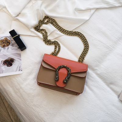 Modern női táska fém díszítéssel, négy színben