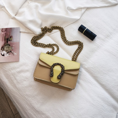 Modern női táska fém díszítéssel, négy színben