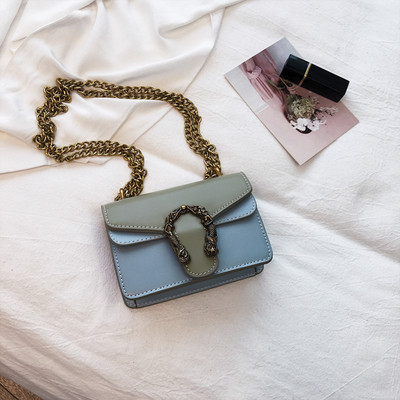 Modern női táska fém díszítéssel, négy színben