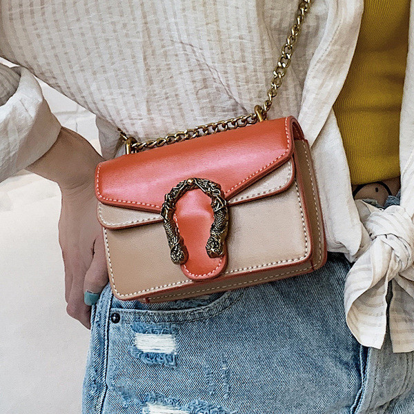 Modern női táska fém díszítéssel, négy színben