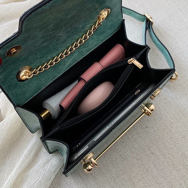 Női bőr táska hosszú füllel több színben