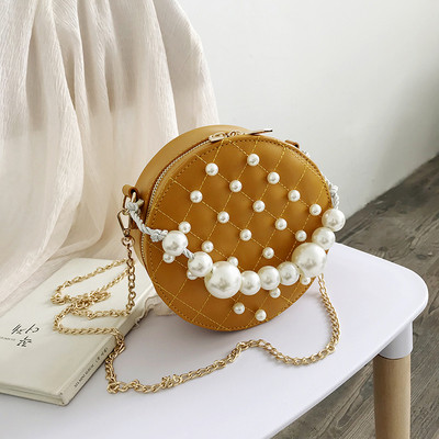 Kör alakú női táska gyöngy díszítéssel