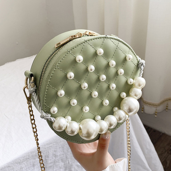 Kör alakú női táska gyöngy díszítéssel