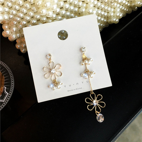 Arany színű női fülbevaló - gyöngyökkel és kövekkel