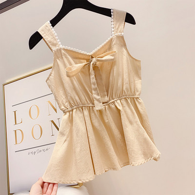 Modern női felső, gombokkal és elemes megkötővel