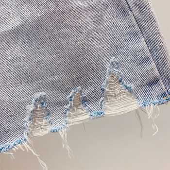 Női farmerszoknya szakadt motívumokkal, kék színben