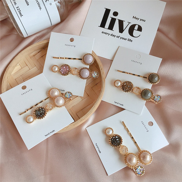 Agrafe de păr pentru femei - un set de două piese în patru culori