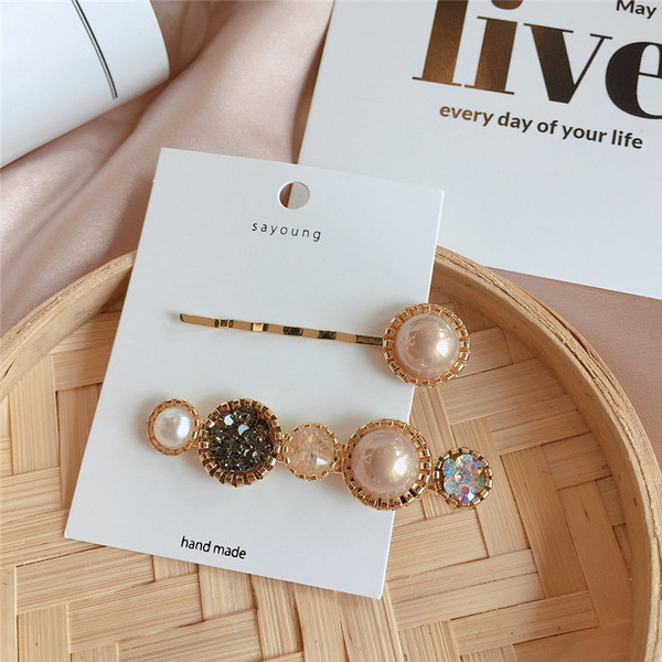 Agrafe de păr pentru femei - un set de două piese în patru culori