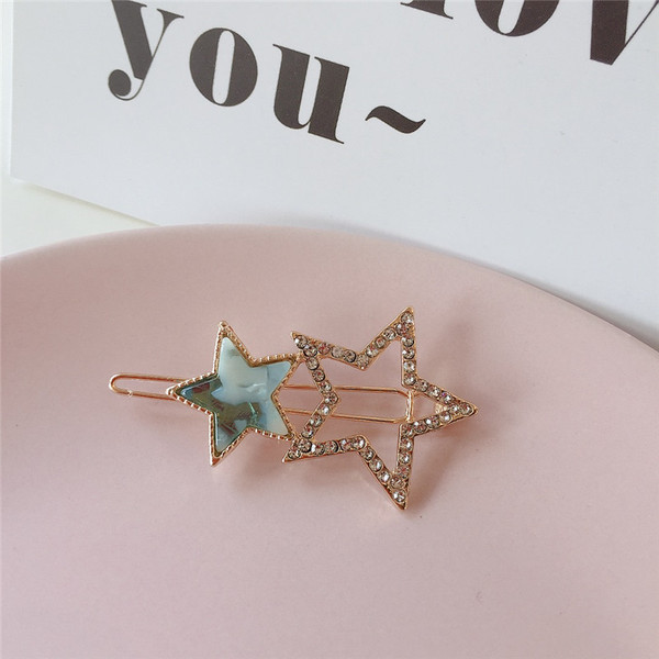 Női hajtűk három színben kövekkel