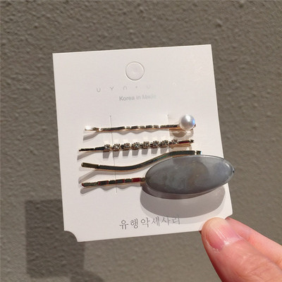 Set de agrafe de păr pentru femei din patru piese în patru culori