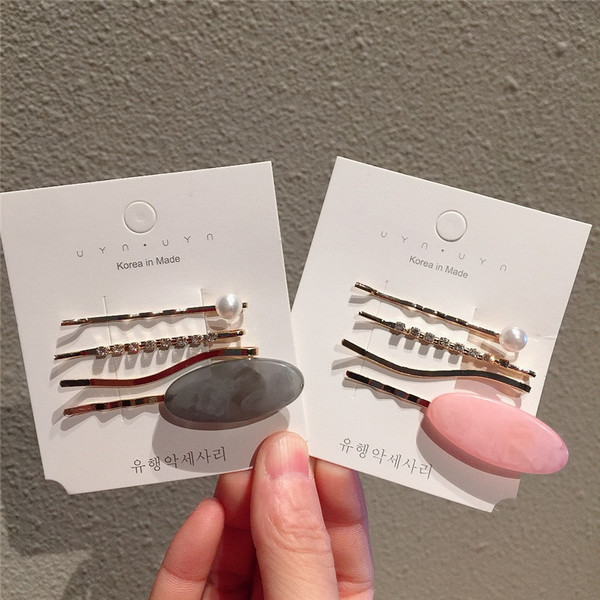 Set de agrafe de păr pentru femei din patru piese în patru culori