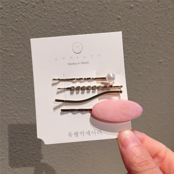 Set de agrafe de păr pentru femei din patru piese în patru culori