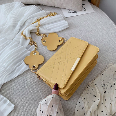 Fém fogantyús női táska több színben