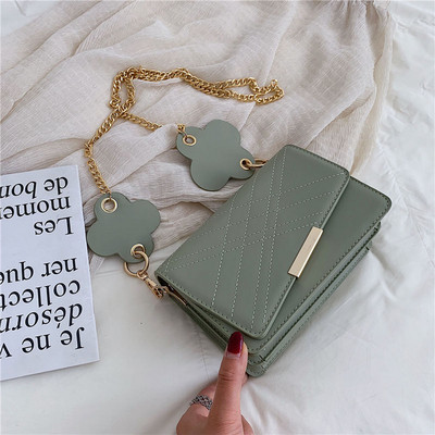 Fém fogantyús női táska több színben