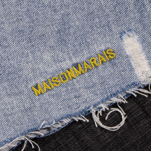 Lezser női rövidnadrág szakadt motívumokkal, kék színben