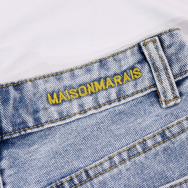 Lezser női rövidnadrág szakadt motívumokkal, kék színben