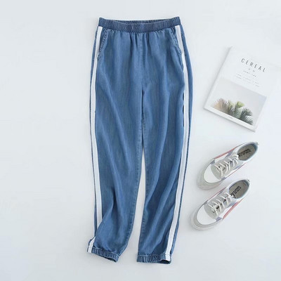 Pantaloni sport de damă cu elastic în talie și gleznă și margine laterală în albastru