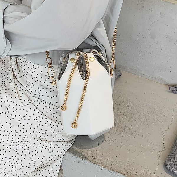 Fém díszítéssel ellátott női táska több színben