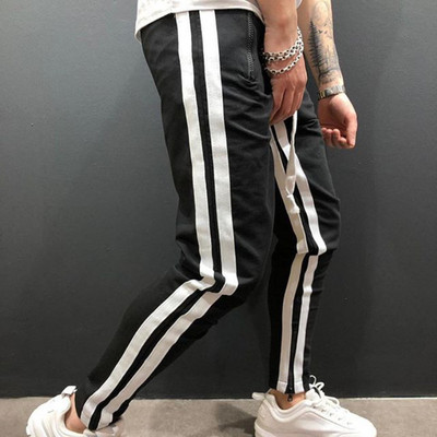 Sport és alkalmi férfi nadrág cipzárral és szegéllyel több színben