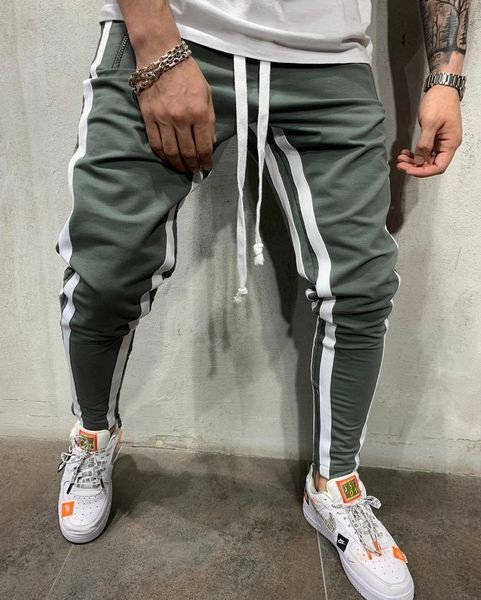 Sport és alkalmi férfi nadrág cipzárral és szegéllyel több színben