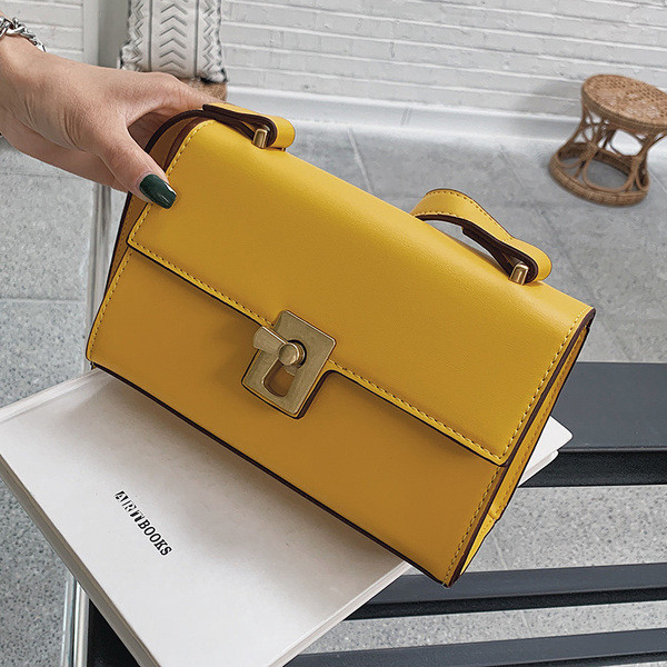 Geanta de dama eleganta cu decor metalic in mai multe culori