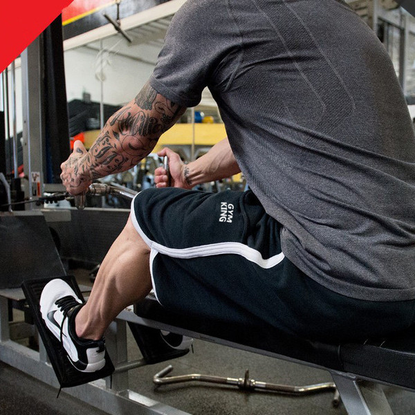 Férfi sportnadrág fekete, piros és szürke felirattal