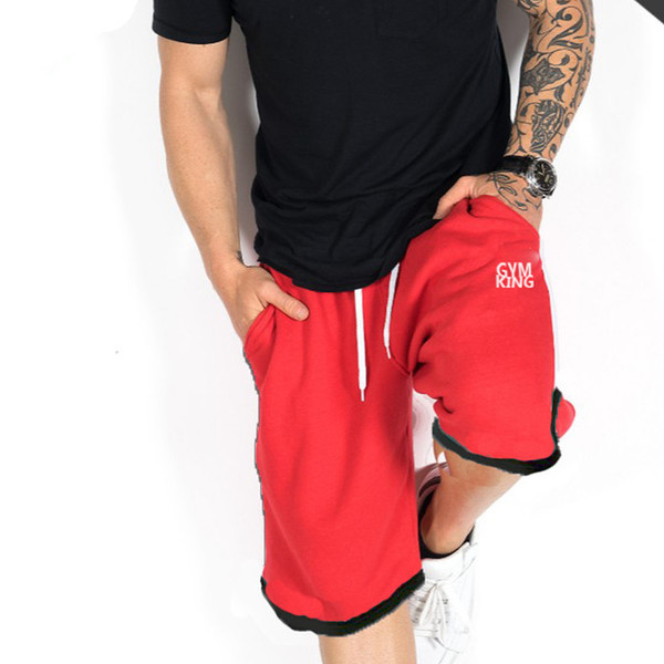 Férfi sportnadrág fekete, piros és szürke felirattal