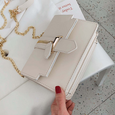 Geanta de dama cu element de fermoar in mai multe culori