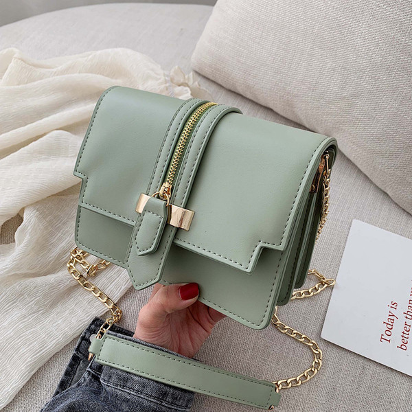 Geanta de dama cu element de fermoar in mai multe culori