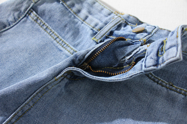 Női farmer szakadt motívumokkal, két színben