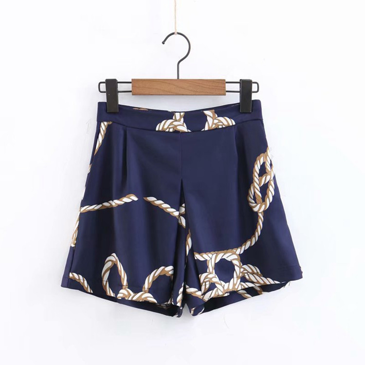 Pantaloni scurți eleganti de damă în albastru și imprimeu