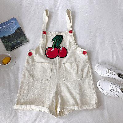 Μοντέρνα γυναικεία ολοσωμη φόρμα με κεντήματα και τσέπες σε μαύρο, λευκό και πράσινο χρώμα