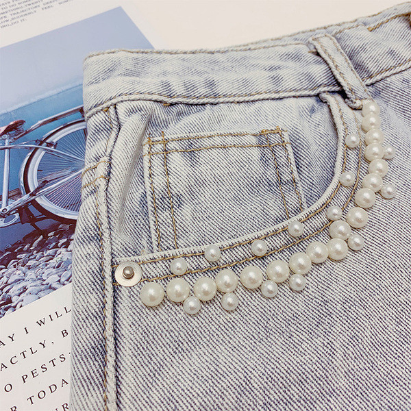 Blugi de dama cu perle de culoare albastra