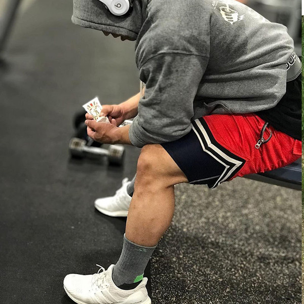 Modern rövidnadrág nyakkendővel és zsebbel több színben